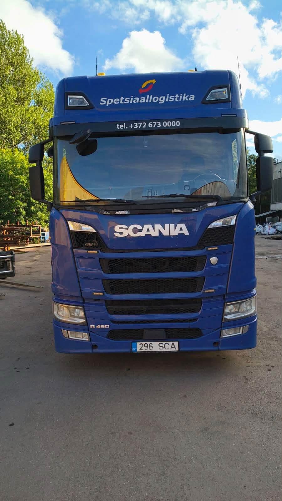 Blue Scania truck before loading at the Novatex yard in Tallinn
