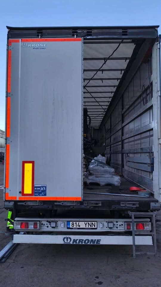 Rear of a Krone curtainsider trailer opened for loading at the Novatex yard in Tallinn