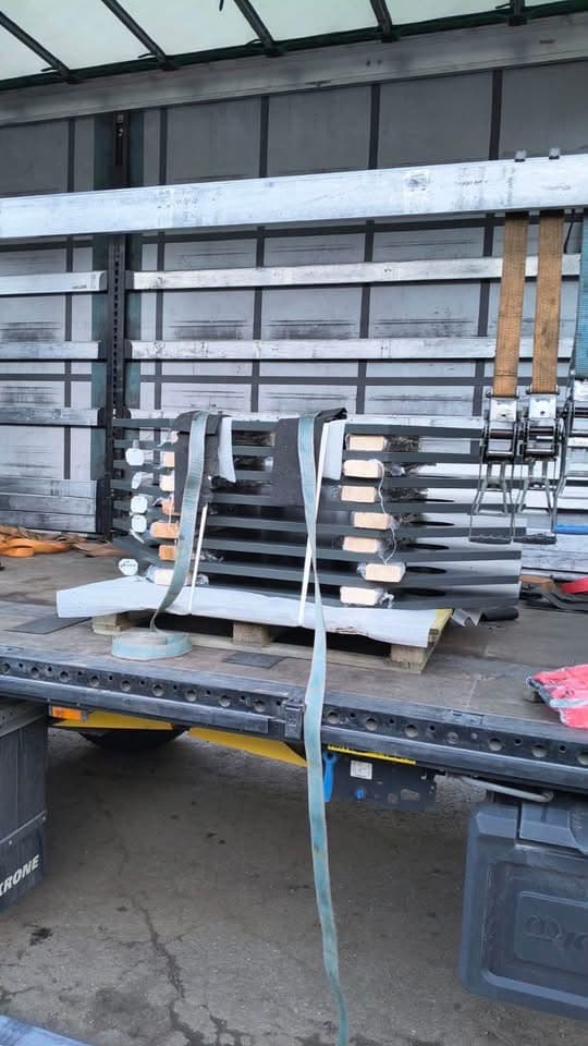 Steel parts on pallets strapped inside a curtainsider trailer at the Novatex yard in Tallinn